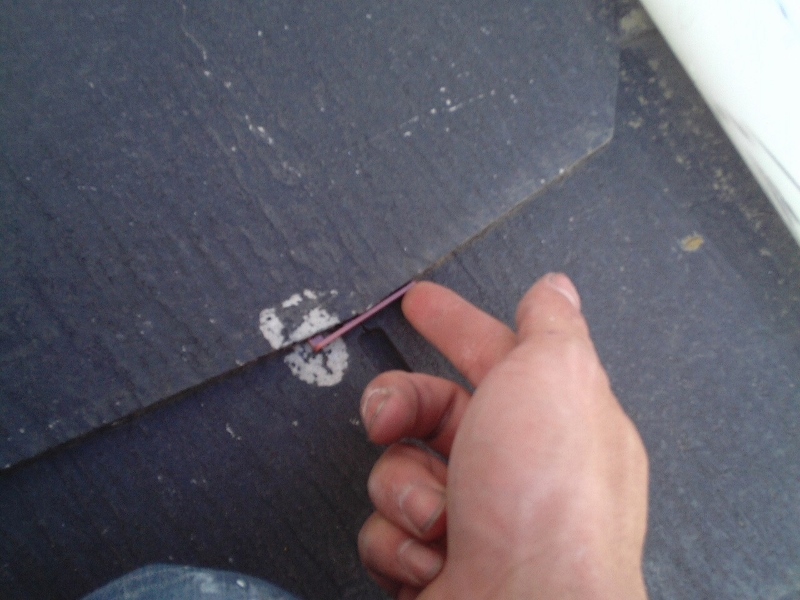 屋根の塗装工事（タスペーサー挿入等）